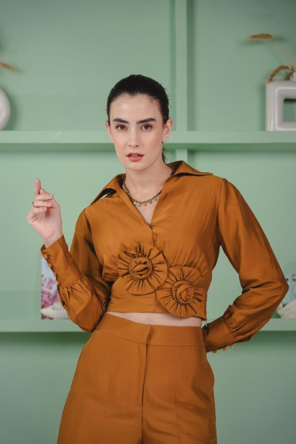 Editorial look in a rust co-ord set