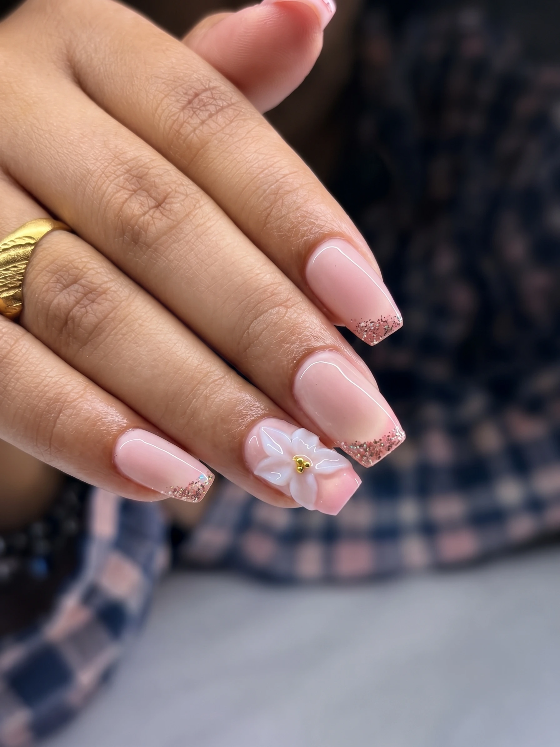 Polygel nail extension with glitter French tips and 3D flower art at Mark Salon, best ladies nail care salon in Hoshiarpur/